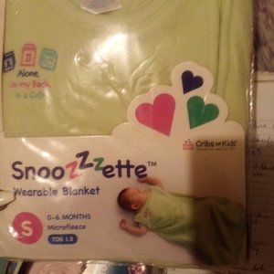 Playyard sheet wearable blanket